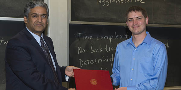 Austin Clements is pictured with Prof. Chandrakasan