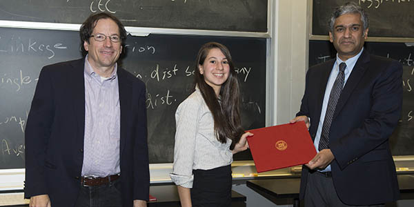 Katherine Bouman receives from Prof. Chandrakasan the second winner Ernst Guillemin award. She is joined by her advisor Prof. Bill Freeman (photo left).