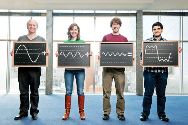 Piotr Indyk, Dina Katabi, Eric Price, and Haitham Hassanieh (left to right) have created a faster way to break down complex signals into combinations of simple waves for processing. Credit: Webb Chappell