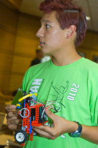 DEECS student at the robot demo