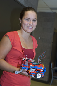 DEECS student and robot