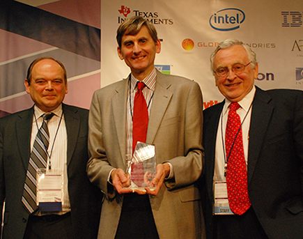 Jesus del Alamo receives the Semiconductor Research Corporation's 2012 Technical Excellence Award from Steven Hillenius, SRC Executive Vice President (left) and Larry Sumney, SRC President & CEO (right), at the TECHON Conference in Austin TX Sept. 10, 2012