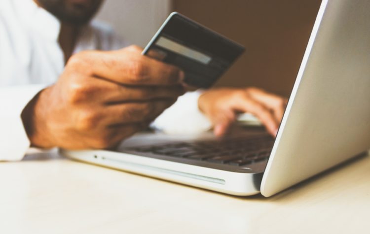 rupixen-com-Q59HmzK38eQ-unsplash-laptop-credit-card-transaction-totals.jpg