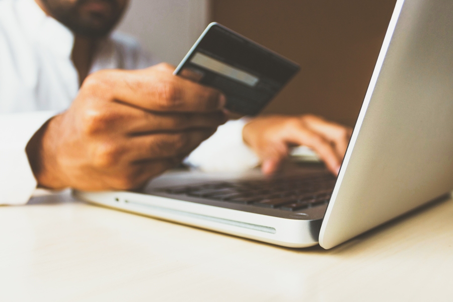 rupixen-com-Q59HmzK38eQ-unsplash-laptop-credit-card-transaction-totals.jpg