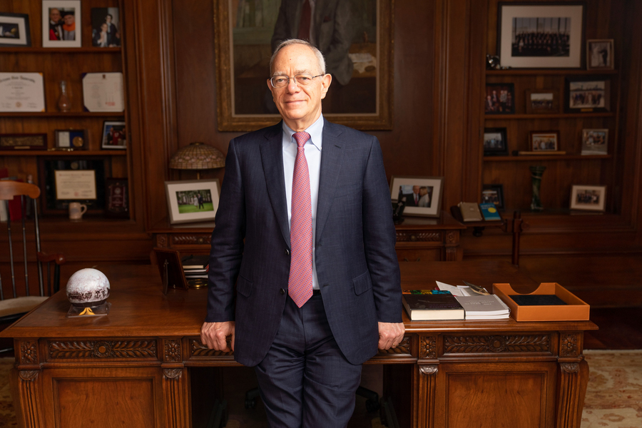 President L. Rafael Reif stands in front of his desk.