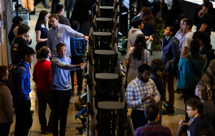 A view over the annual SuperUROP poster session, held in MIT's Stata Center.